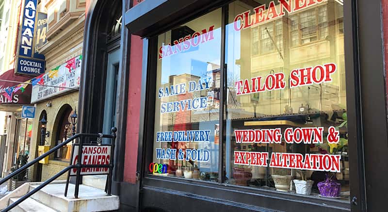 The storefront decoration of Sansom Cleaners in Center City Philadelphia
